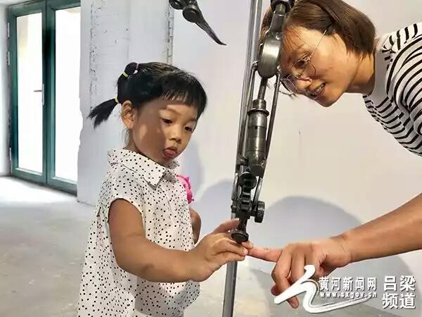 吕梁：一个80后青年让机械“活”起来